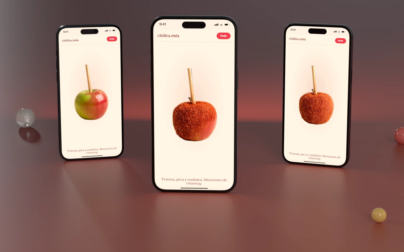 Tres teléfonos con la manzana cruda, a media caída del chile y ya cubierta